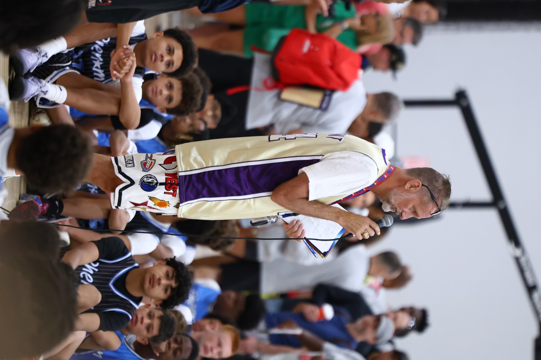 Coach Dave Taylor coaching at a Phenom camp wearing a Kobe Bryant Lakers jersey
